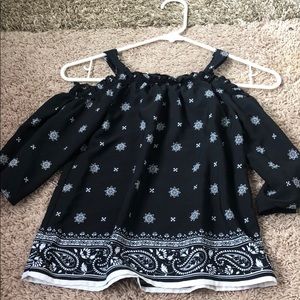 Off the shoulder shirt.